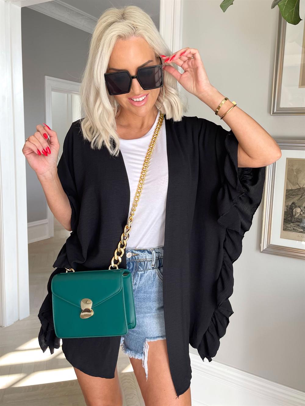 Sabbie - Cardigan med flæsekant